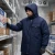 Worker In Walk In Freezer Wearing Hooded Insulated Parka