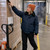 Female Worker Wearing Freezer Jacket For Work