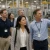 Visitors wearing clear safety glasses while touring a manufacturing facility