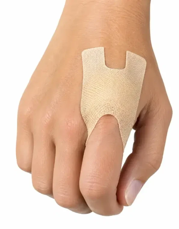 Woven fabric knuckle bandage applied to hand for flexible first aid protection
