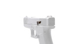 Photo of Primatia Raised and Extended Slide Release showing it installed with the Glock Slimline pistol grayed out, angled view Photo of Primatia Raised and Extended Slide Release showing it installed with the Glock Slimline pistol grayed out, angled view
