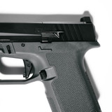 Raised and Extended Slide Release for Ruger RXM