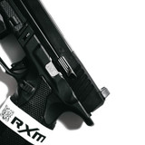 Raised and Extended Slide Release for Ruger RXM