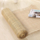 Gros plan du tissage en rotin naturel pour cannage de chaise, texture détaillée