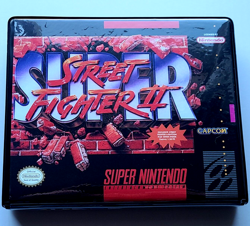 Front view of a Cart Armor® Super Street Fighter II Super Nintendo SNES Premium 16-bit Clamshell Case