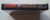 Spine view of a Cart Armor® Ultimate Mortal Kombat 3 Nintendo SNES Premium 16-bit Clamshell Case