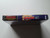 Spine view of a Cart Armor® Smash T.V. Nintendo NES Premium 8-bit Clamshell Case
