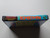 Spine view of a Cart Armor® Bomberman Nintendo NES Premium 8-bit Clamshell Case