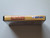 Spine view of a Cart Armor® P.O.W. Prisoners of War Nintendo NES Premium 8-bit Clamshell Case