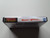 Spine view of a Cart Armor® Maniac Mansion Nintendo NES Premium 8-bit Clamshell Case