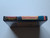 Spine view of a Cart Armor® Gun.Smoke Nintendo NES Premium 8-bit Clamshell Case