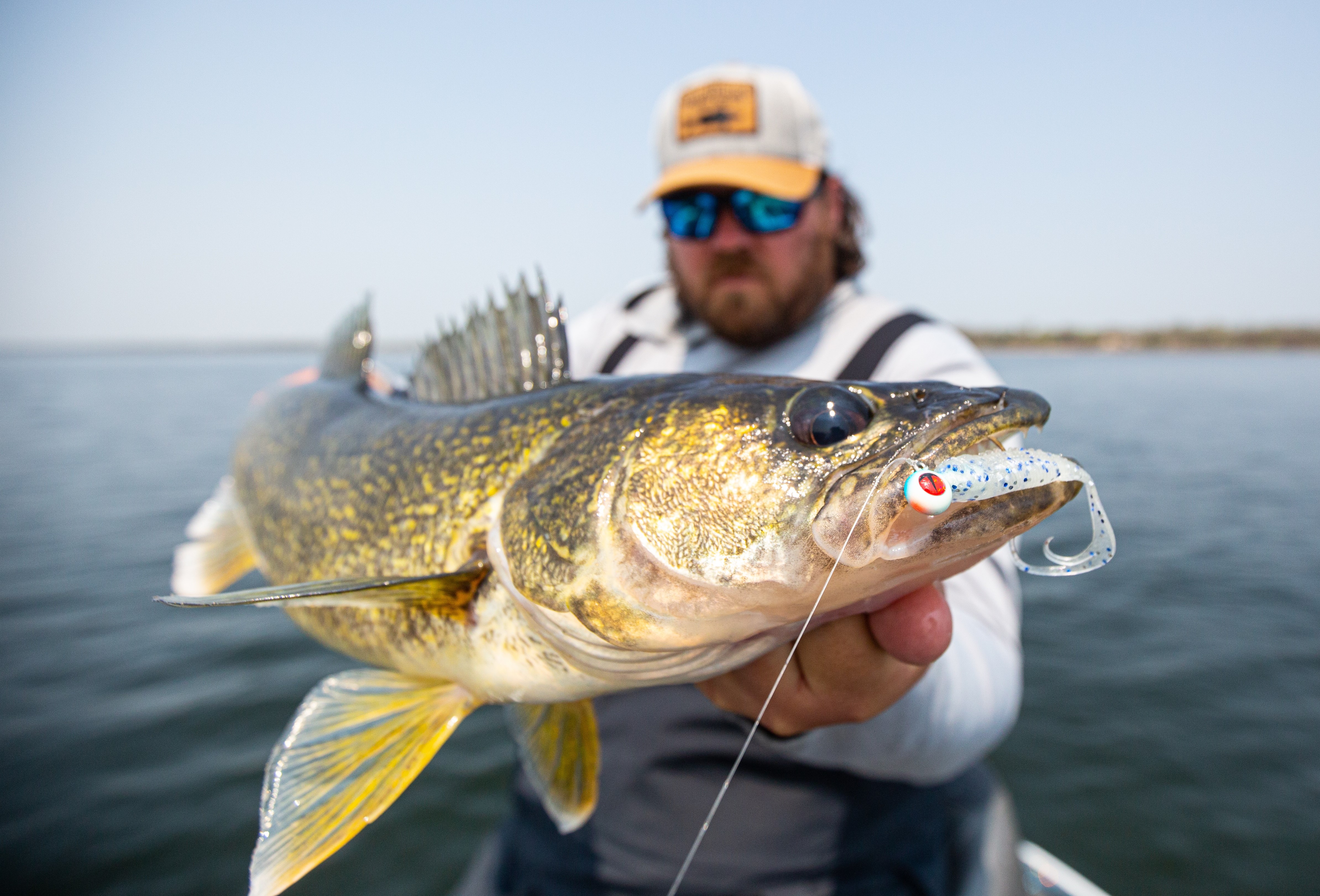 a man holding a fish