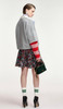 Grey layered cotton sweatshirt with red and pink striped sleeves