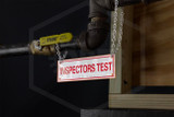 Inspectors Test Sign | 6 in. x 2 in. | White w/ Red Letters | Installed