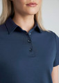 A navy blue women's polo shirt featuring a collar and button placket, with a fitted short sleeve design.