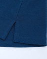 A navy blue men's polo featuring a pique texture and side vents at the hem. It has a logo.