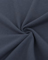 A close-up of navy cotton/poly pique fabric, showcasing the texture and drape of the material.