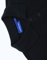 A black ladies' classic cotton/poly pique short-sleeve polo featuring a collar and buttons, with a label visible.