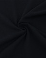 A close-up of black cotton/poly pique fabric, showing its soft texture and drape. The image has a swirling pattern.