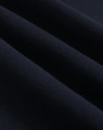 A close-up of dark navy fleece fabric, showcasing its soft texture and smooth finish.