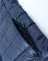 A lightweight, sustainable kids' hooded puffer jacket in navy blue with a zippered opening. Features a logo.