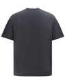 A heavy cotton oversized tee in dark grey, featuring a simple design and a relaxed fit. The garment has a logo.