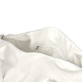 A white canvas duffel bag with a spacious interior and a small zipped pocket. It features a logo.