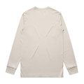 A long-sleeved, cream-coloured t-shirt with a plain back and fitted cuffs. It features a small logo.