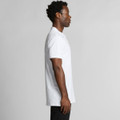 A white polo shirt displayed on a model from the side, featuring a logo on the chest.
