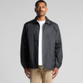 A black coach jacket with a front snap closure and a relaxed fit, featuring a logo on the chest.