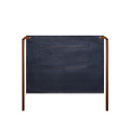 Denim half apron in dark blue with a large pocket and brown ties, featuring a logo.