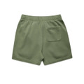 Faded green track shorts featuring an elastic waistband and a single back pocket. Includes branding on the garment.