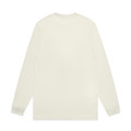 A long-sleeve tee shirt in a muted cream colour, featuring a simple design with a logo.