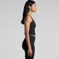 A fitted black active bra tank with thin straps, displayed on a model from the side.
