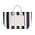 A striped tote bag featuring navy blue and cream colours with two handles and a front pocket. It has a logo.