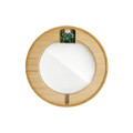 A wireless charger with a round bamboo design and a sleek glass surface, featuring a visible circuit board.