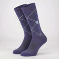 A pair of purple equestrian socks featuring a diamond pattern and a branding logo.