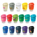 A collection of colourful reusable cups with various lids and branding, featuring shades of green, white, orange, and blue.