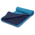 A rolled-up cooling towel in blue and navy, featuring a textured surface and a smooth side. It has a logo.