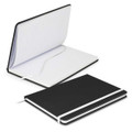 A black notebook with a white elastic band and lined pages, open to display its interior.