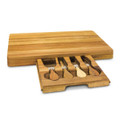 A wooden cheese board with a pull-out drawer containing four cheese knives. The board features a natural wood finish.