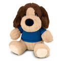 A plush dog toy with brown and beige fur, wearing a blue shirt, features large eyes and soft, floppy ears.