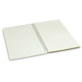 A medium-sized notebook featuring lined pages and a spiral binding, presented in a pale colour.