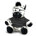 A plush zebra toy with black and white stripes, wearing a grey shirt, featuring a black tuft on its head.
