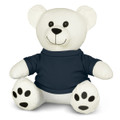 A white plush bear toy with a smiling face, wearing a navy blue shirt and black paw prints on its feet.