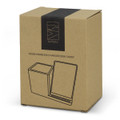 A cardboard box containing the NATURA Oaken Wireless Charger Desk Caddy, featuring a minimalist design and a logo.