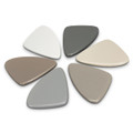 A set of six pebble-shaped coasters in various shades of grey, beige, and white, featuring a smooth finish.