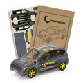 A wooden model of a hatchback car in grey, featuring a logo and accompanied by assembly parts and instructions.