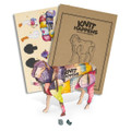A wooden model of a sheep in vibrant colours, displayed with its packaging and craft supplies for assembly.