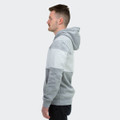 A grey and white unisex hoodie featuring a logo, displayed on a model from the side.